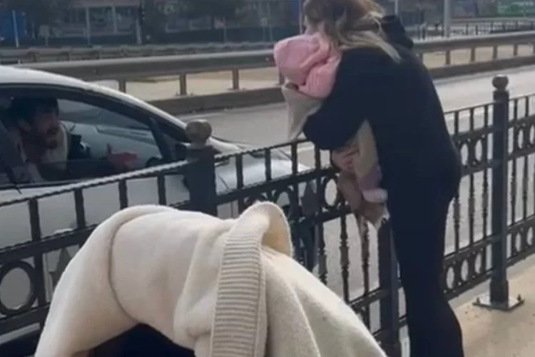 Sokak ortasında dehşet anları! Genç eşini ve bebeğini metrelerce sürükledi!